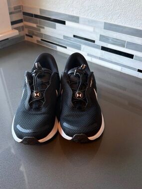 Nike Women’s Black and White Slip-On Athletic sneakers